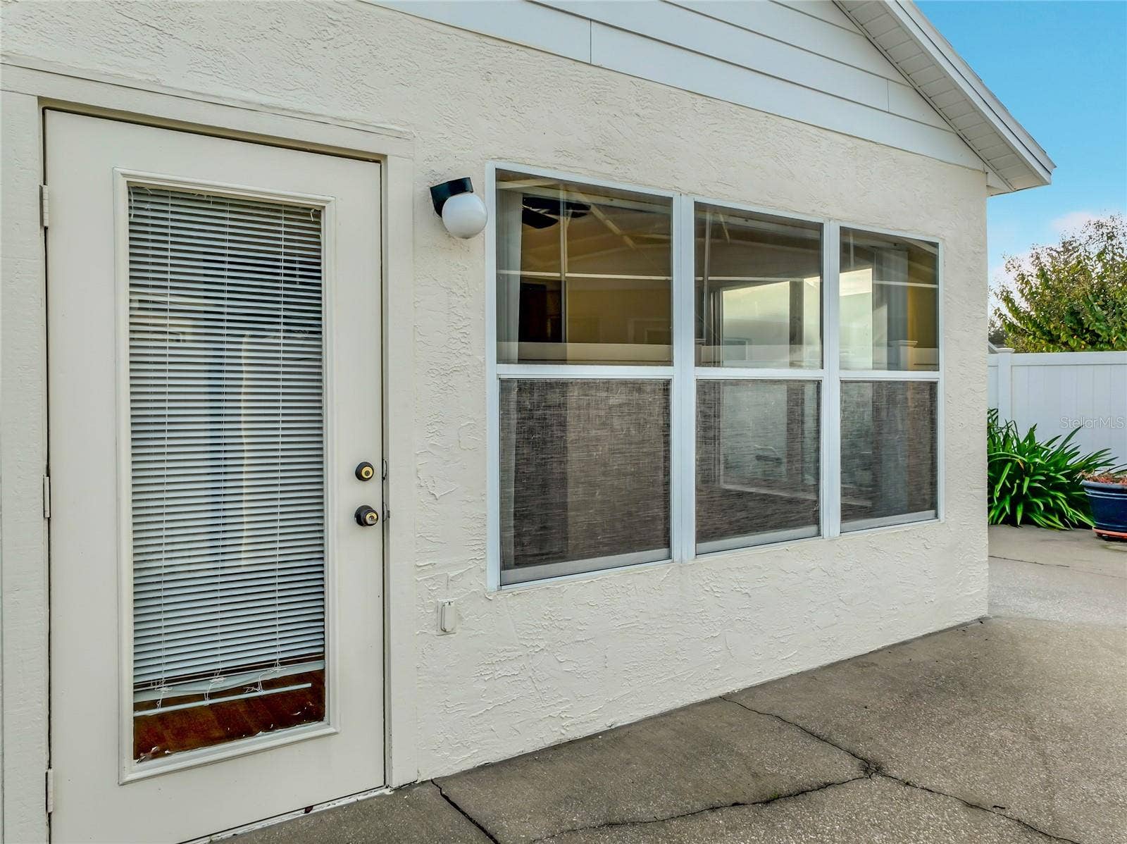 Back door from sunroom to patio.