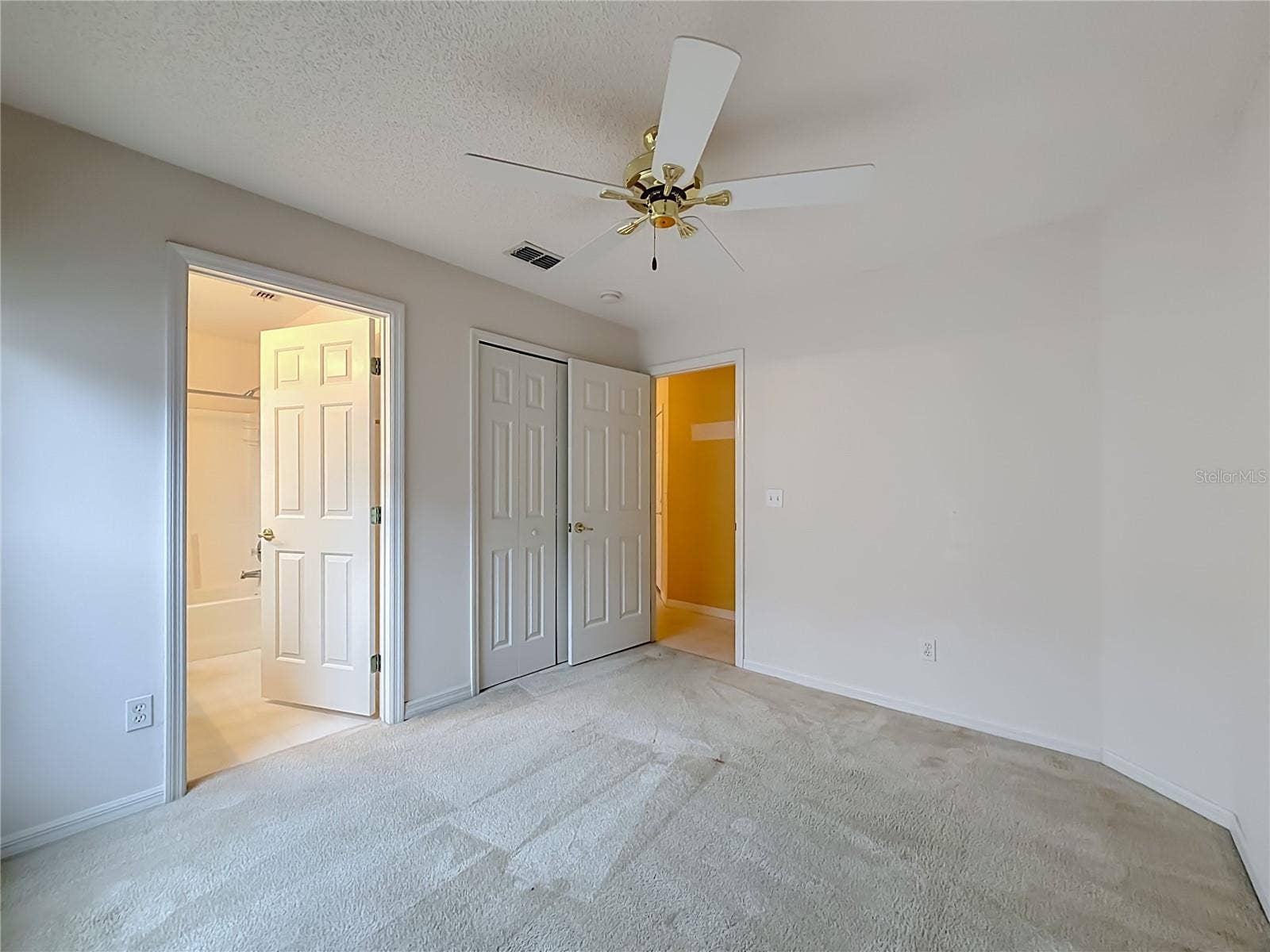 Bedroom 2 with entry to second full bath