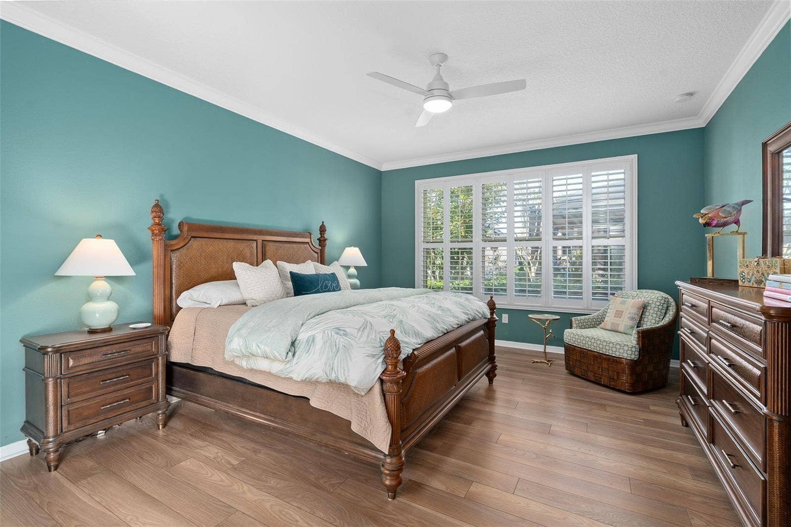 1038 TIMBERVALE TRAIL, Clermont, FL 34715 Primary Bedroom suite with Luxury Vinyl Plank Flooring Crown Molding and Plantation Shutters