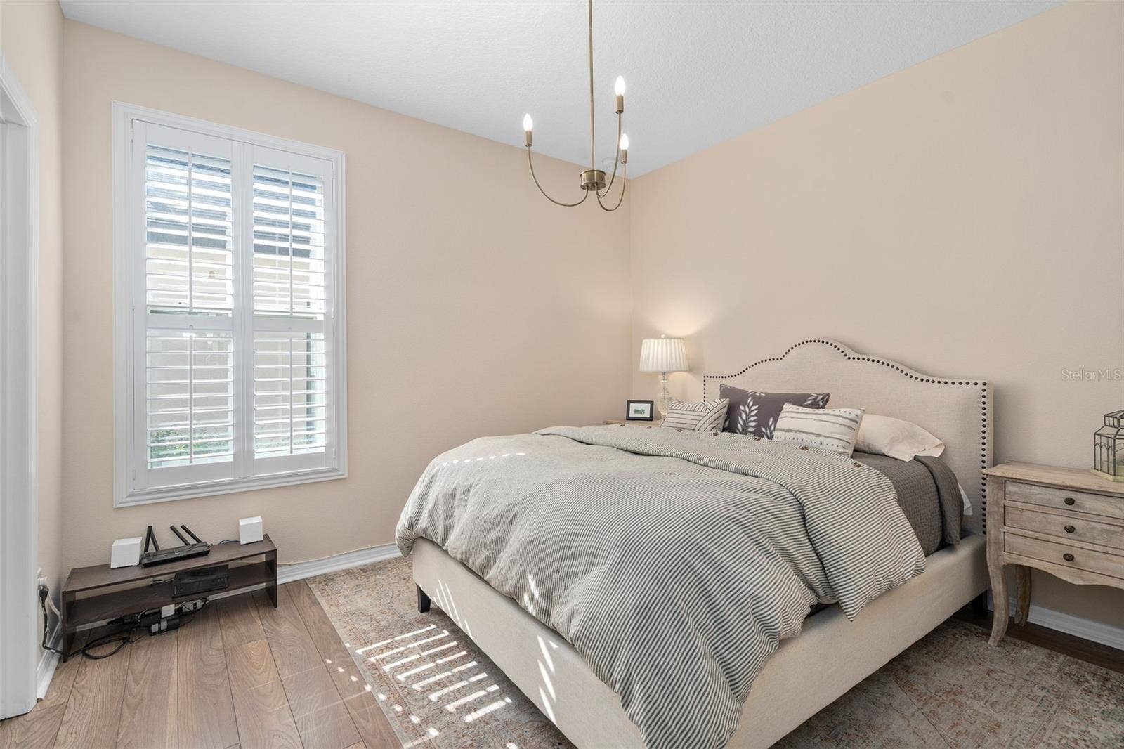 1038 TIMBERVALE TRAIL, Clermont, FL 34715 Bedroom 2 with LVP flooring has its own En-Suite and is very comfortable for Guests