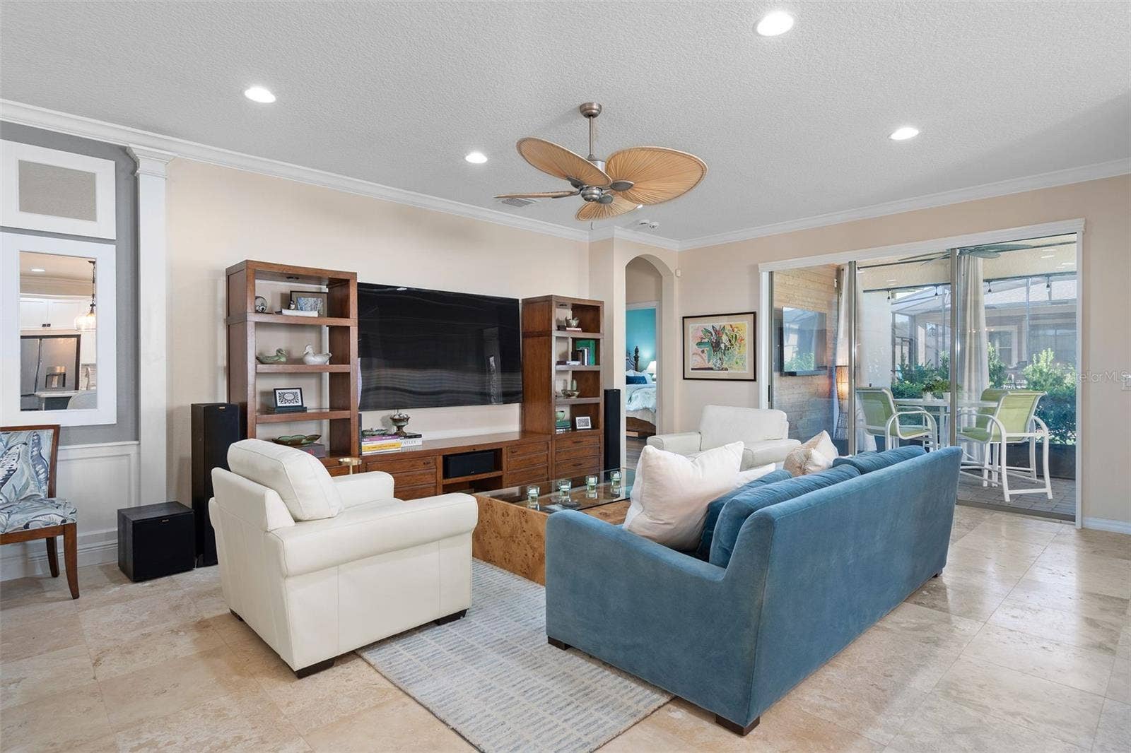1038 TIMBERVALE TRAIL, Clermont, FL 34715 There is direct access to the Screened Lanai from the Family Room