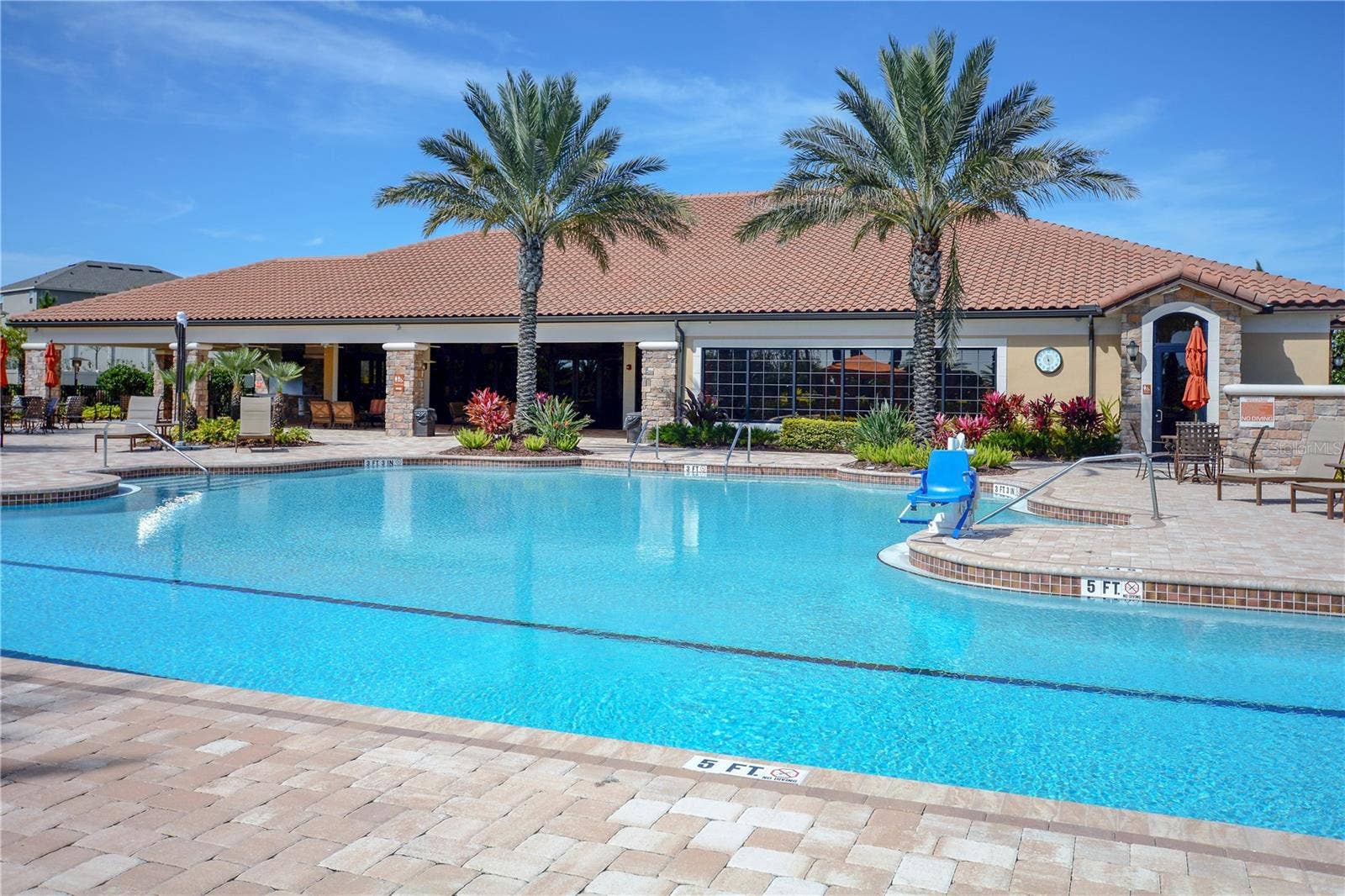 1038 TIMBERVALE TRAIL, Clermont, FL 34715 Amenities Pool with the Clubhouse in view