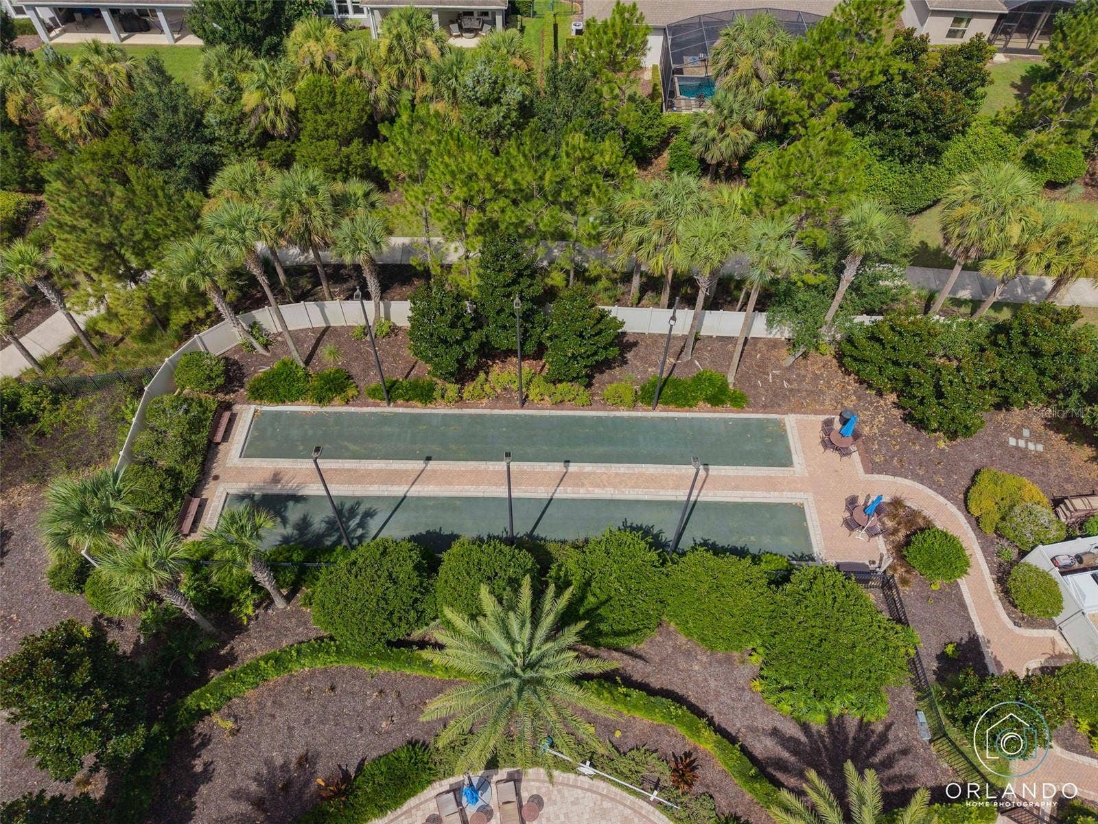 1038 TIMBERVALE TRAIL, Clermont, FL 34715 Clay Bocce' Courts. The Courts are lighted for nighttime play.
