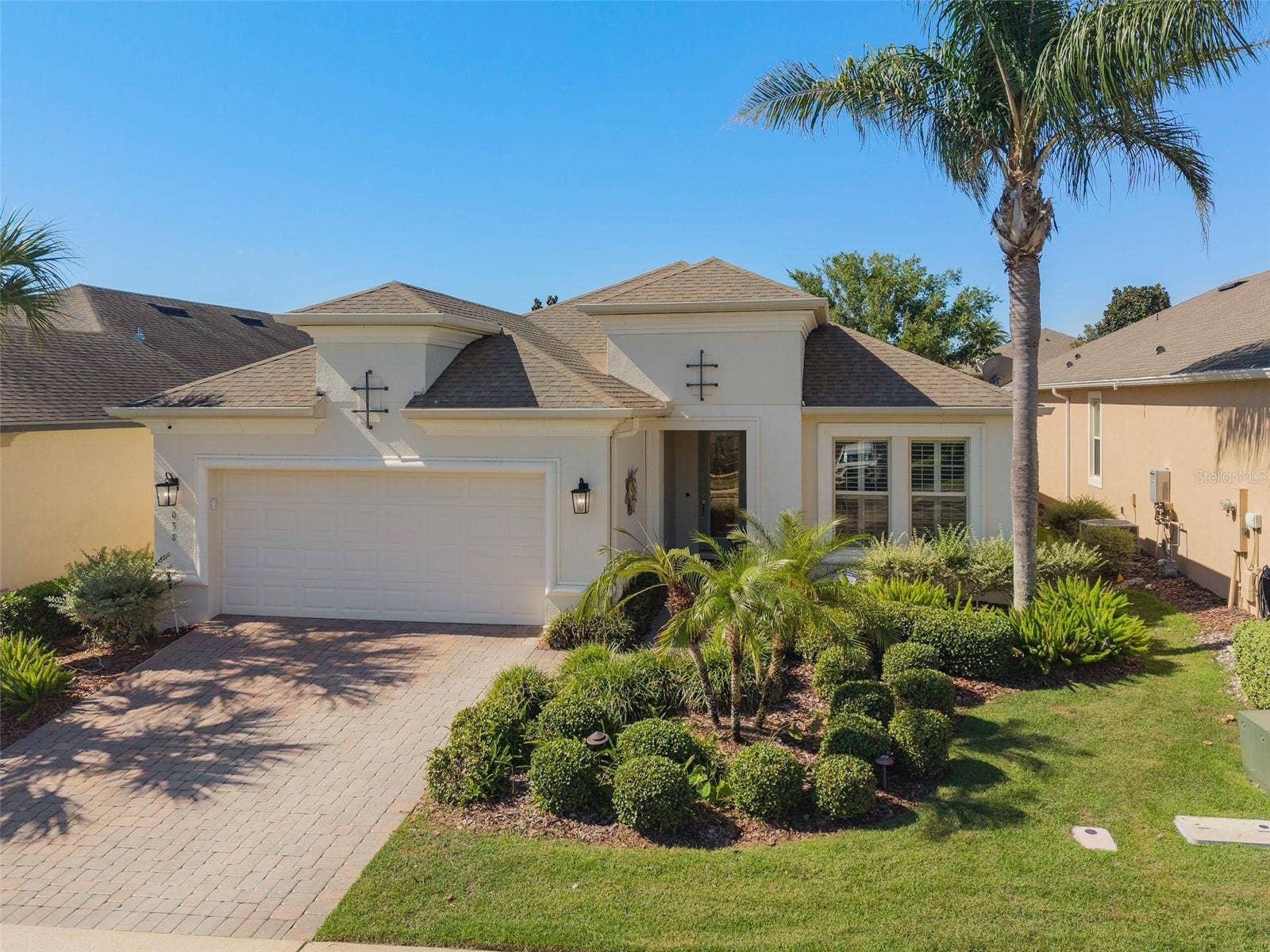 1038 TIMBERVALE TRAIL, Clermont, FL 34715 Front View with Beautiful Landscaping/Curb Appeal and the Upgraded "B" Elevation