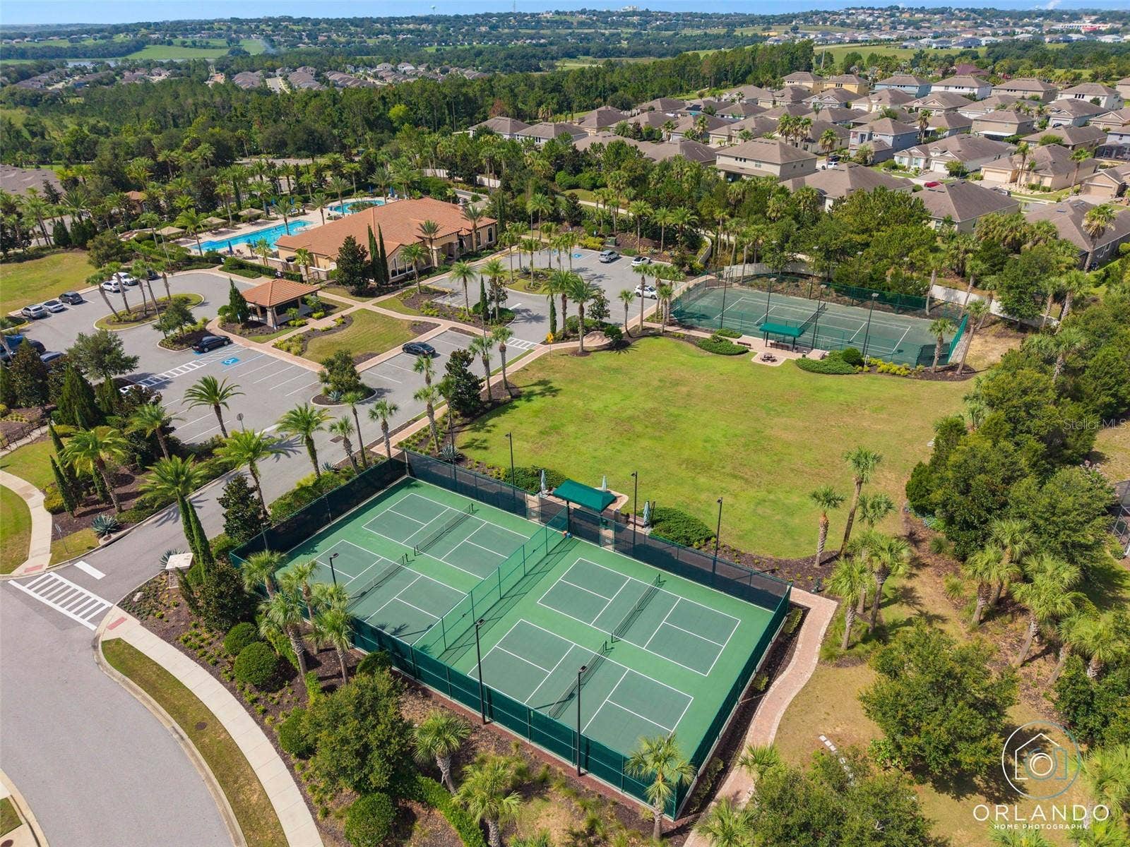 1038 TIMBERVALE TRAIL, Clermont, FL 34715 4 Pickle Ball Courts for your playing enjoyment. The Courts are lighted for nighttime play.