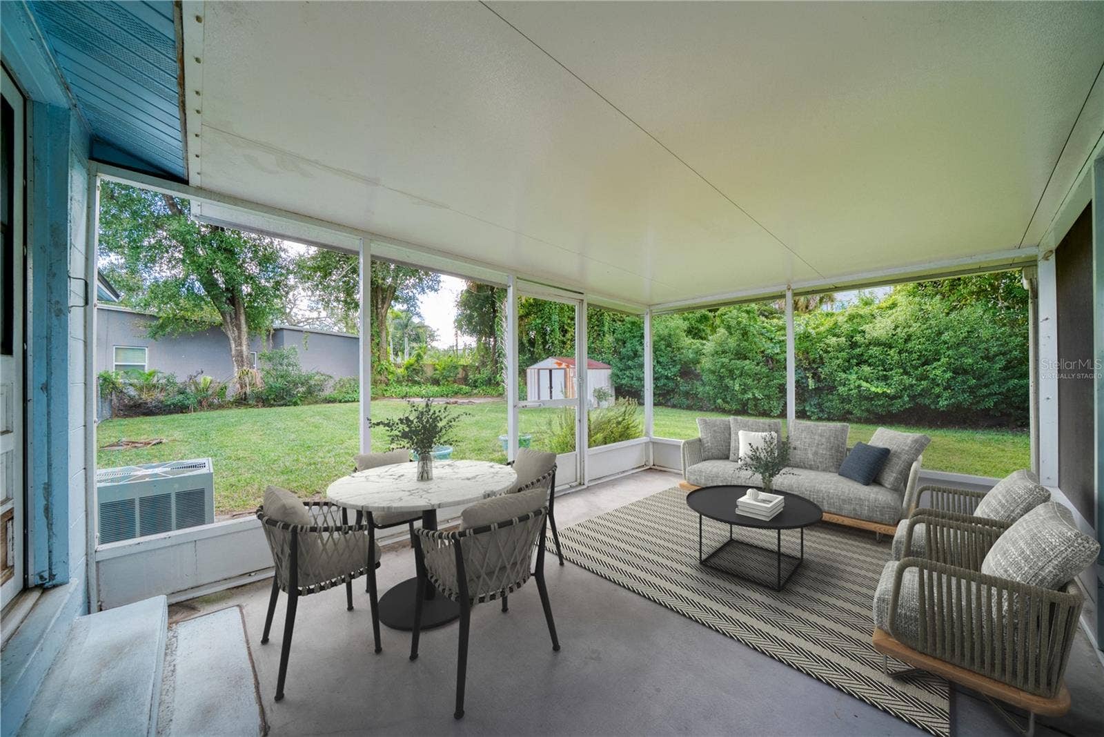 1622 TULANE STREET, Orlando, FL 32804 Screened porch virtually staged.