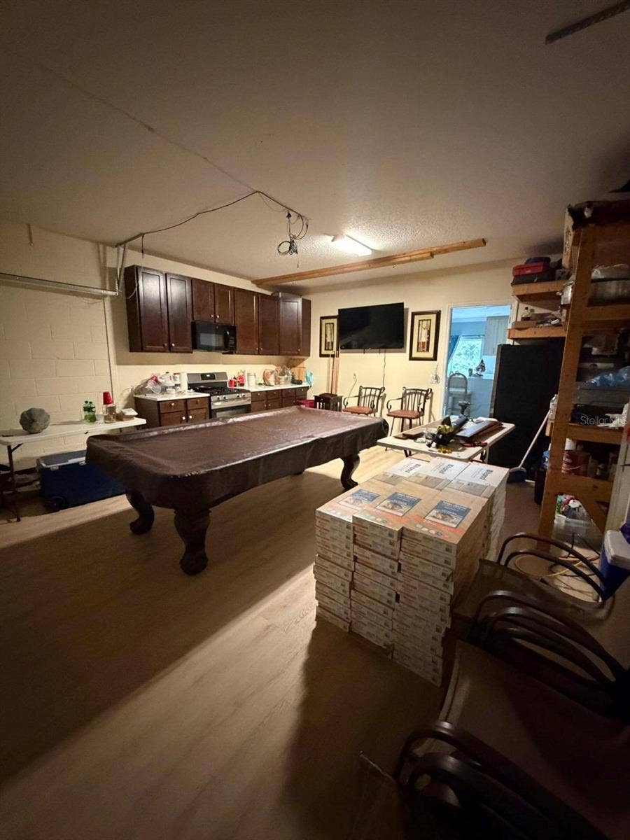 15549 GEMINI DRIVE, Mascotte, FL 34753 Garage kitchen