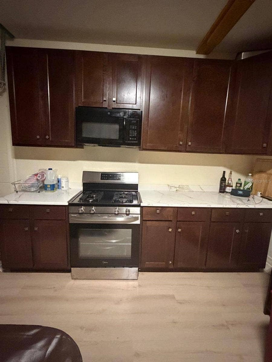 15549 GEMINI DRIVE, Mascotte, FL 34753 garage kitchen