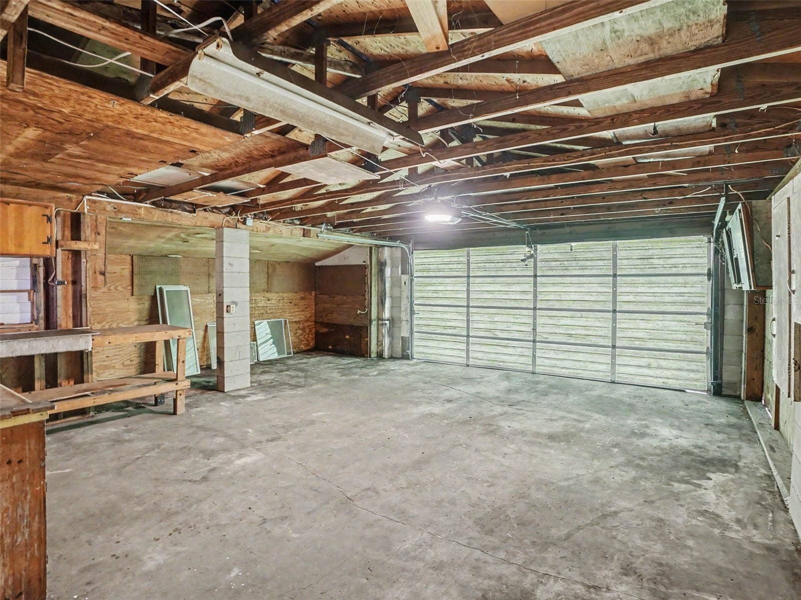 2417 S MYRTLE AVENUE, Sanford, FL 32771 Rear load garage with workshop area