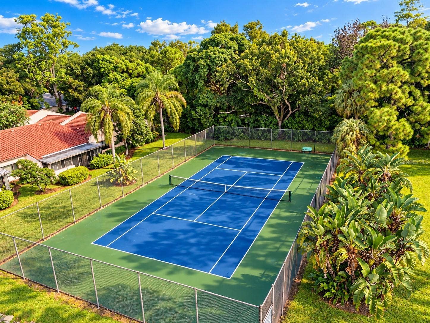 9533 86TH AVENUE, #9533, Seminole, FL 33777 Community Tennis court - virtually enhanced