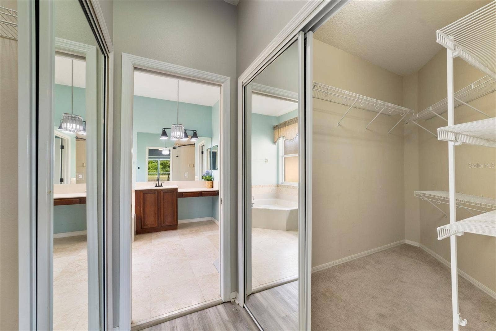1557 AMARYLLIS CIRCLE, Orlando, FL 32825 TWO WALK-IN CLOSETS in the Primary Suite provide generous storage.