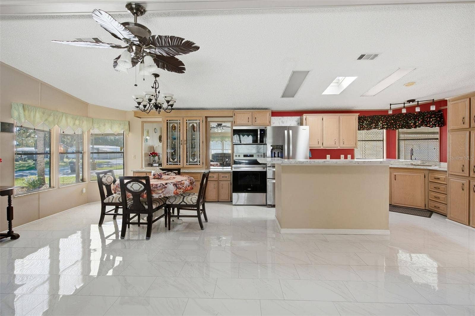 Virtually enhanced image depicting the anticipated finished appearance of the kitchen island. Island finishing work is pending completion.