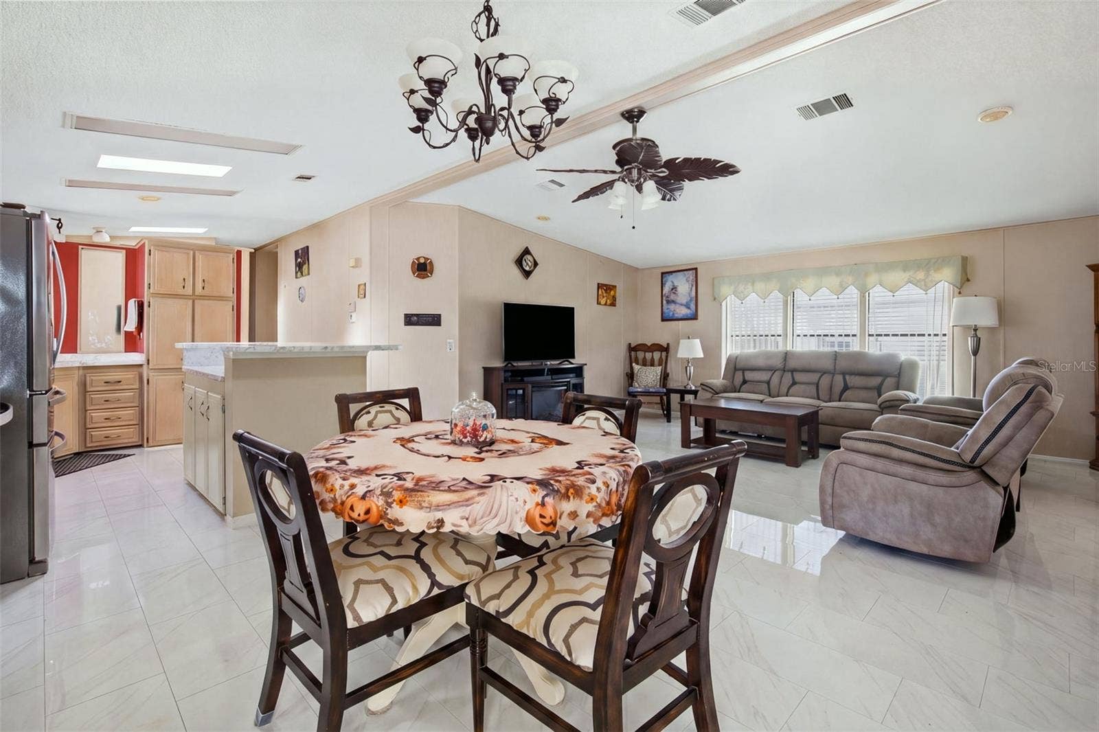 Virtually enhanced image depicting the anticipated finished appearance of the kitchen island. Island finishing work is pending completion.