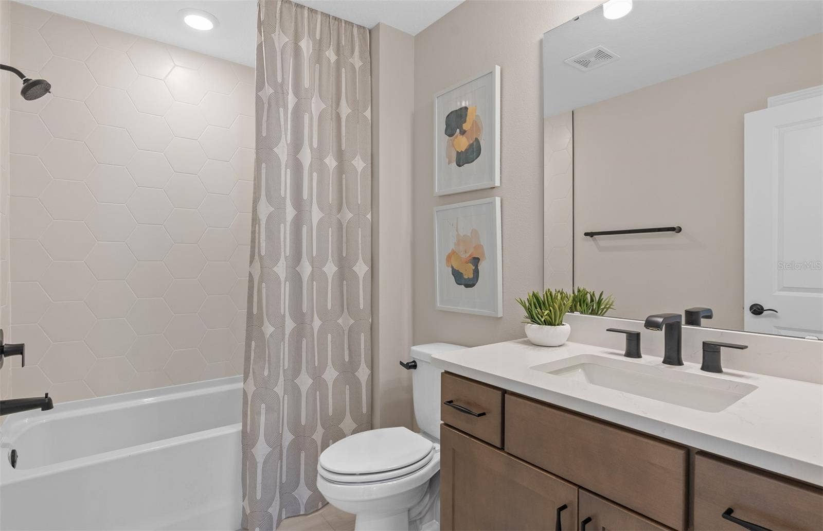 16700 MINT MEADOW ROAD, Orlando, FL 32820 Model Home Design Only. Pictures and furnishings are for illustrative purposes only. Elevations, colors and options may vary. Furniture is for model home staging only.?