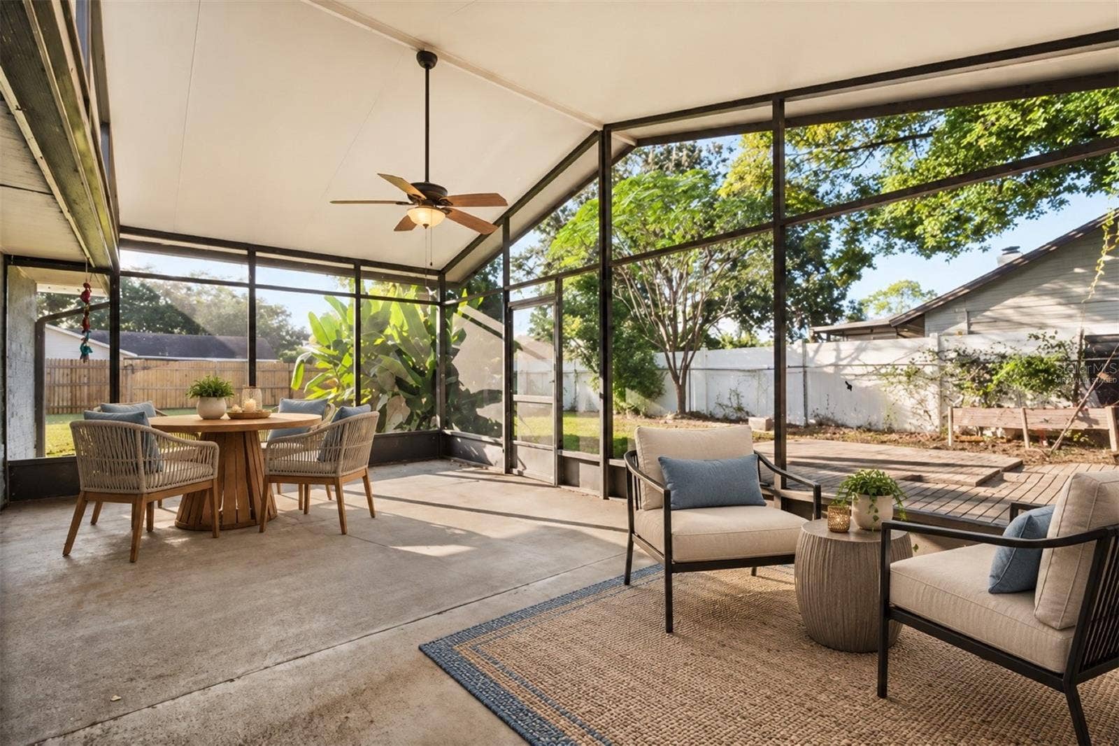 5125 FORMBY DRIVE, Orlando, FL 32812 Covered rear porch- Virtually staged