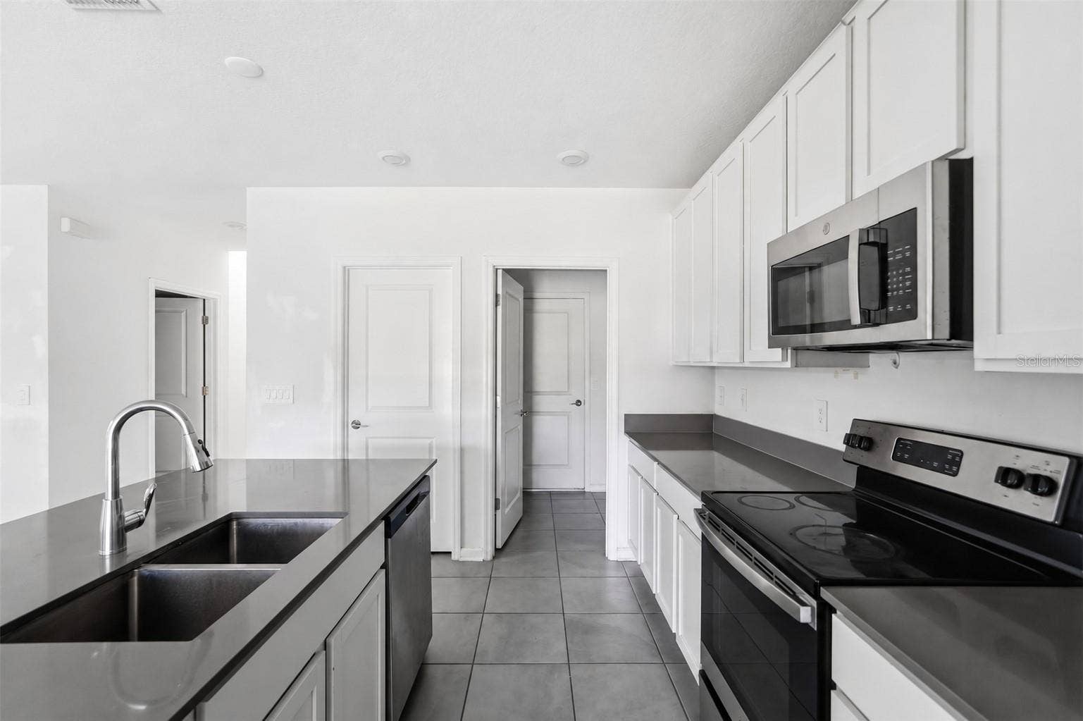 Kitchen comes with stainless steel appliances