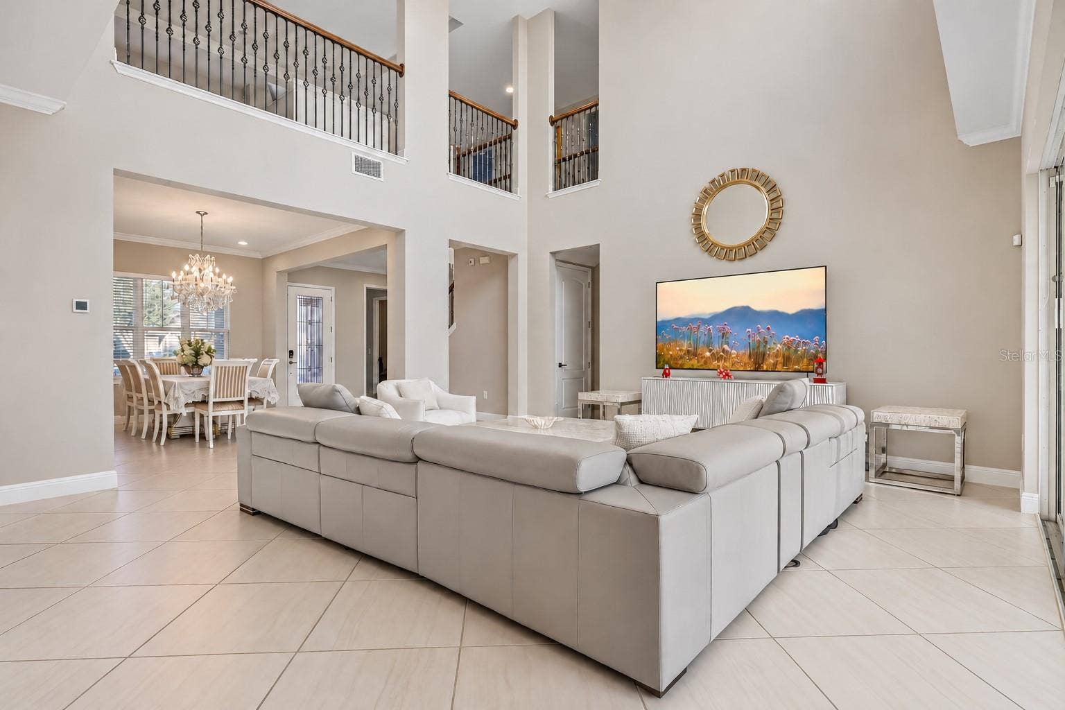 15646 SWEET LEMON WAY, Winter Garden, FL 34787 Two story living room with views of the catwalk.