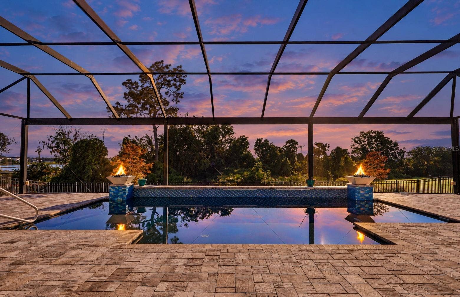 15646 SWEET LEMON WAY, Winter Garden, FL 34787 Your personal backyard oasis awaits! Virtual twilight/fire.