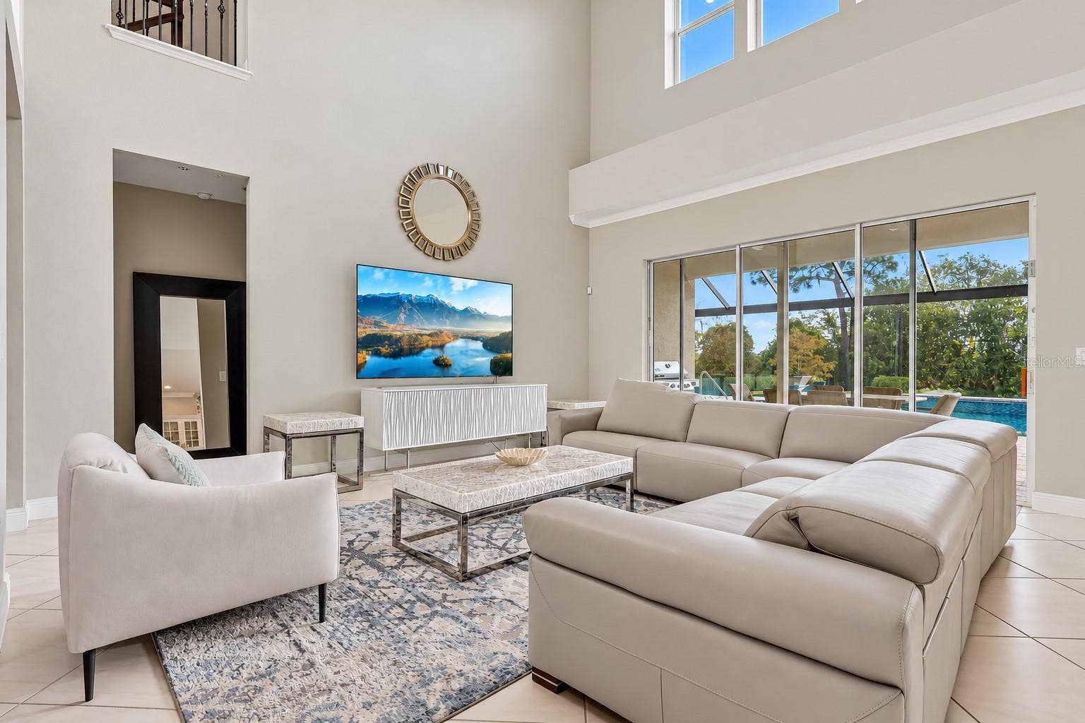 15646 SWEET LEMON WAY, Winter Garden, FL 34787 The two story living room makes a grand first impression.