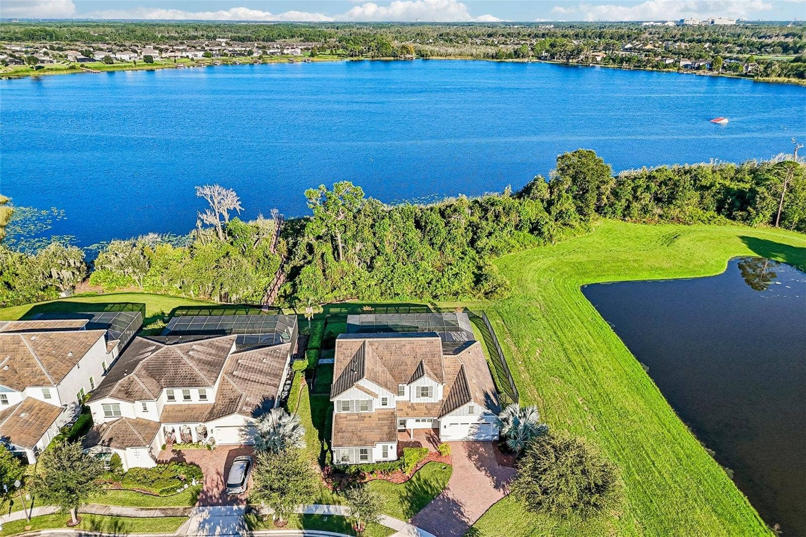 15646 SWEET LEMON WAY, Winter Garden, FL 34787 Skiable Lake Huckleberry is the perfect backdrop for this home.