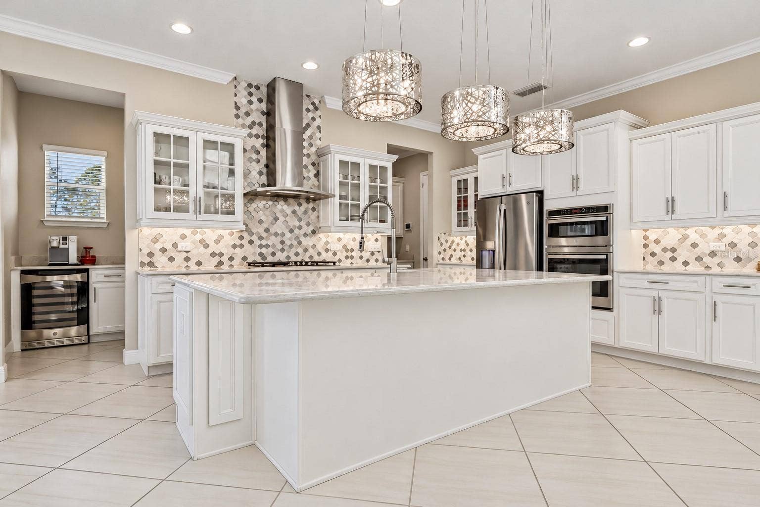 15646 SWEET LEMON WAY, Winter Garden, FL 34787 The stylish kitchen anchors the versatile main floor.