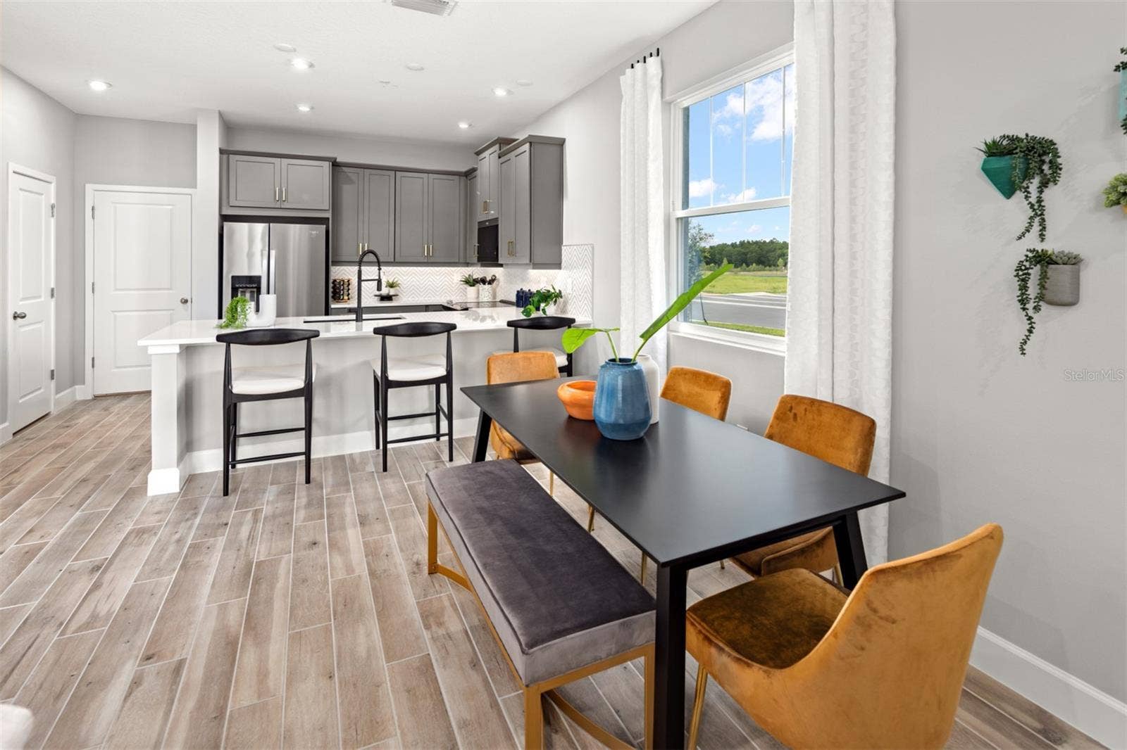2263 NIGHTSHADE GROVE LANE, Apopka, FL 32712 Gardenia Reserve Catalina II Model Kitchen and Dining Room