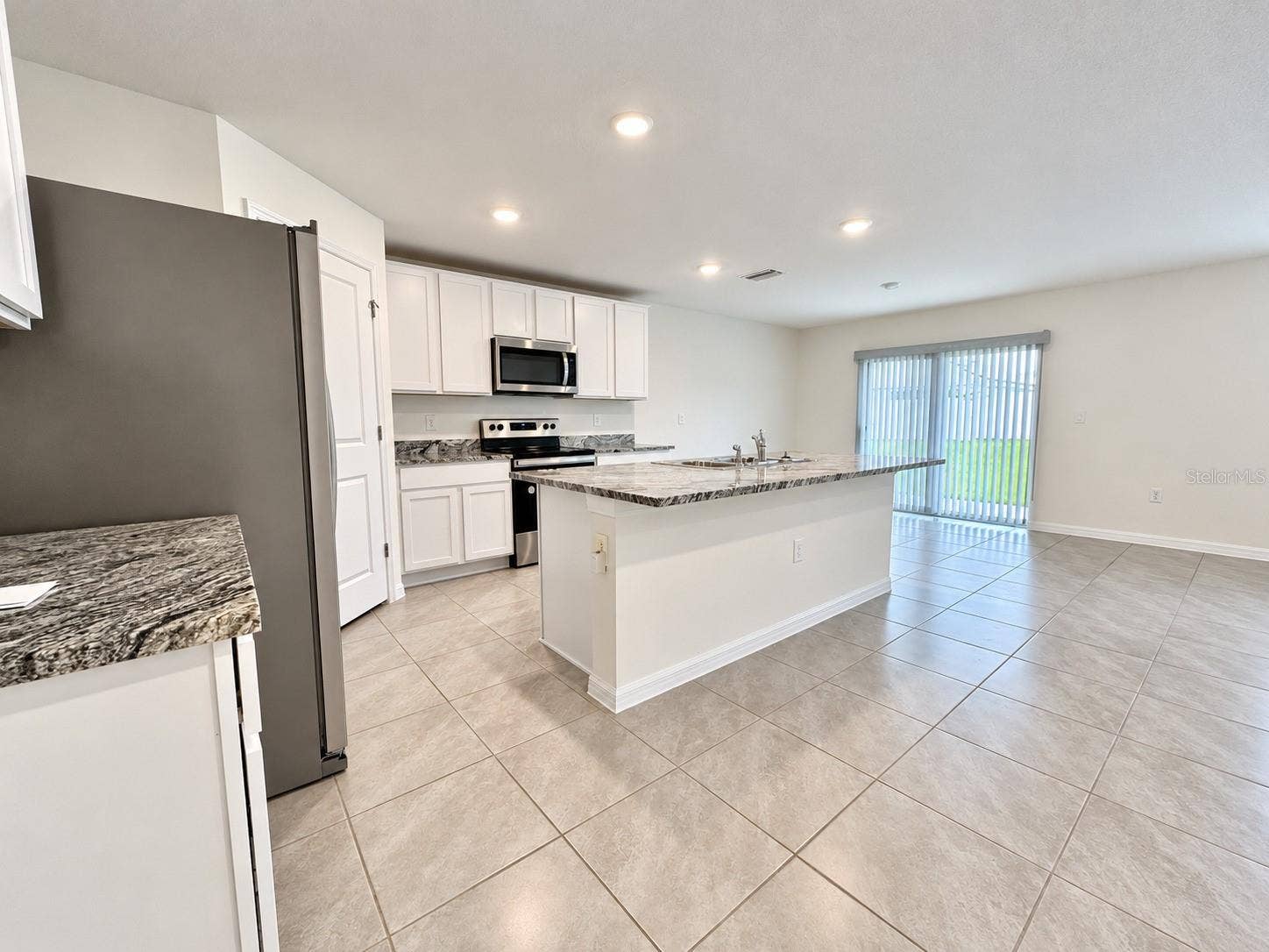 16535 WINDMILL FORGE PASS, Wimauma, FL 33598 Kitchen & dining area