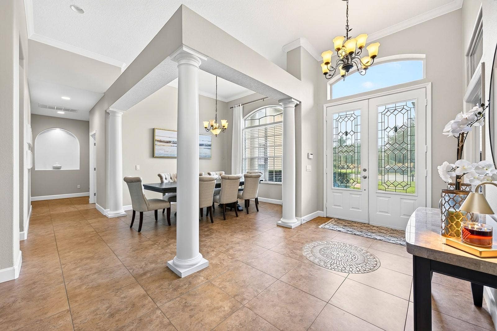 609 VIANA COURT, Winter Springs, FL 32708 Double entry doors, formal spaces and a dedicated office set the tone for this versatile floor plan.