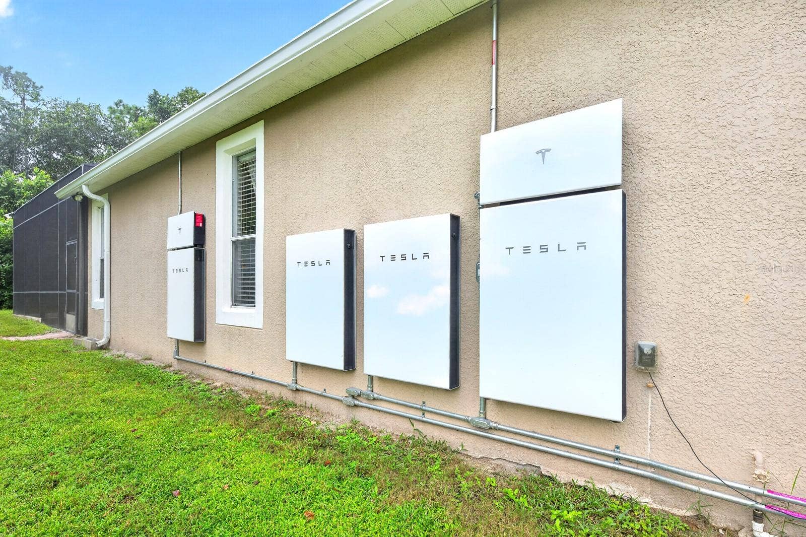 609 VIANA COURT, Winter Springs, FL 32708 4 Tesla powerwalls leave this large home virtually free of any electric bills.