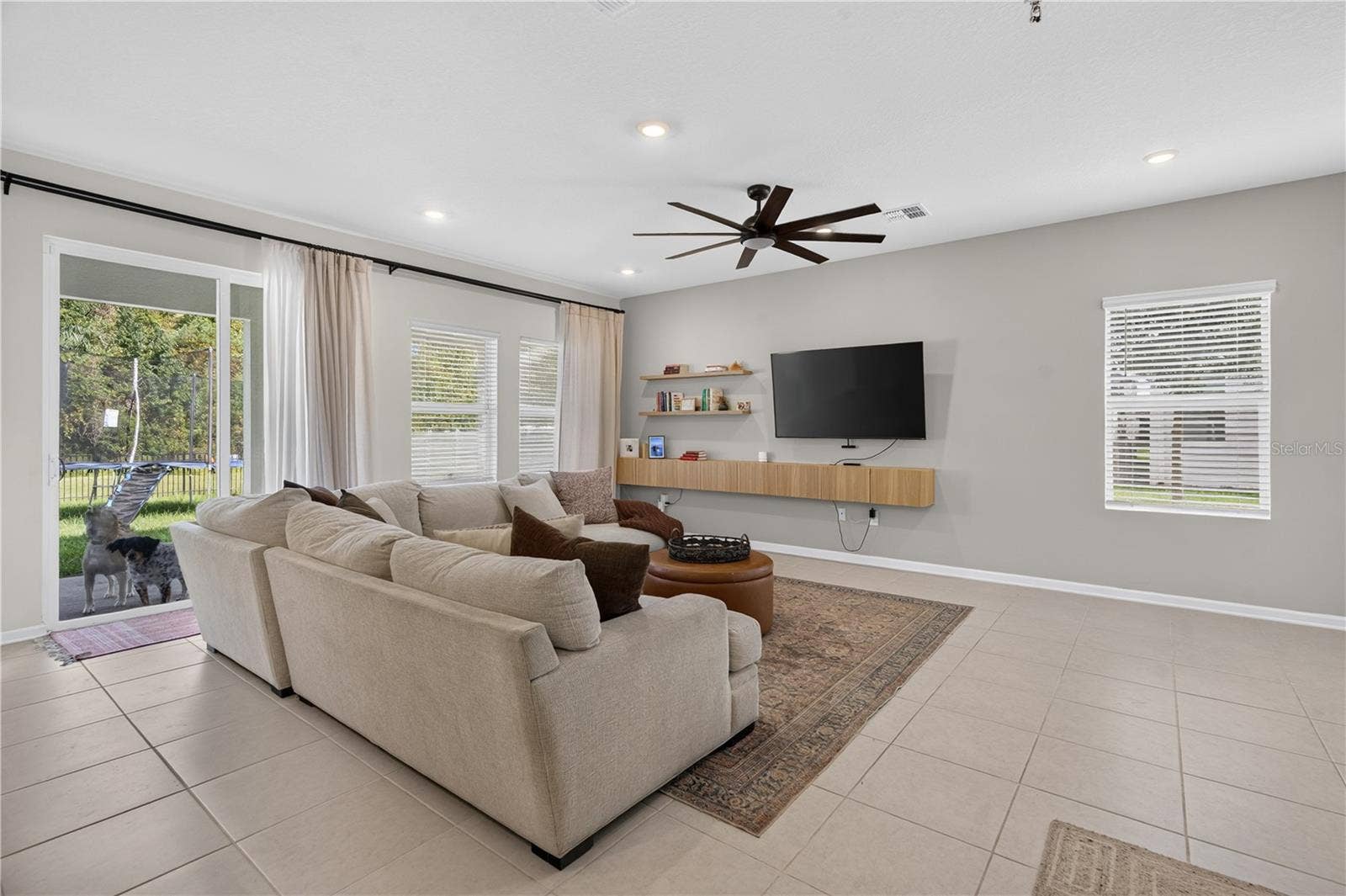 685 PERONI AVENUE, Debary, FL 32713 Living Area with Sliding Door