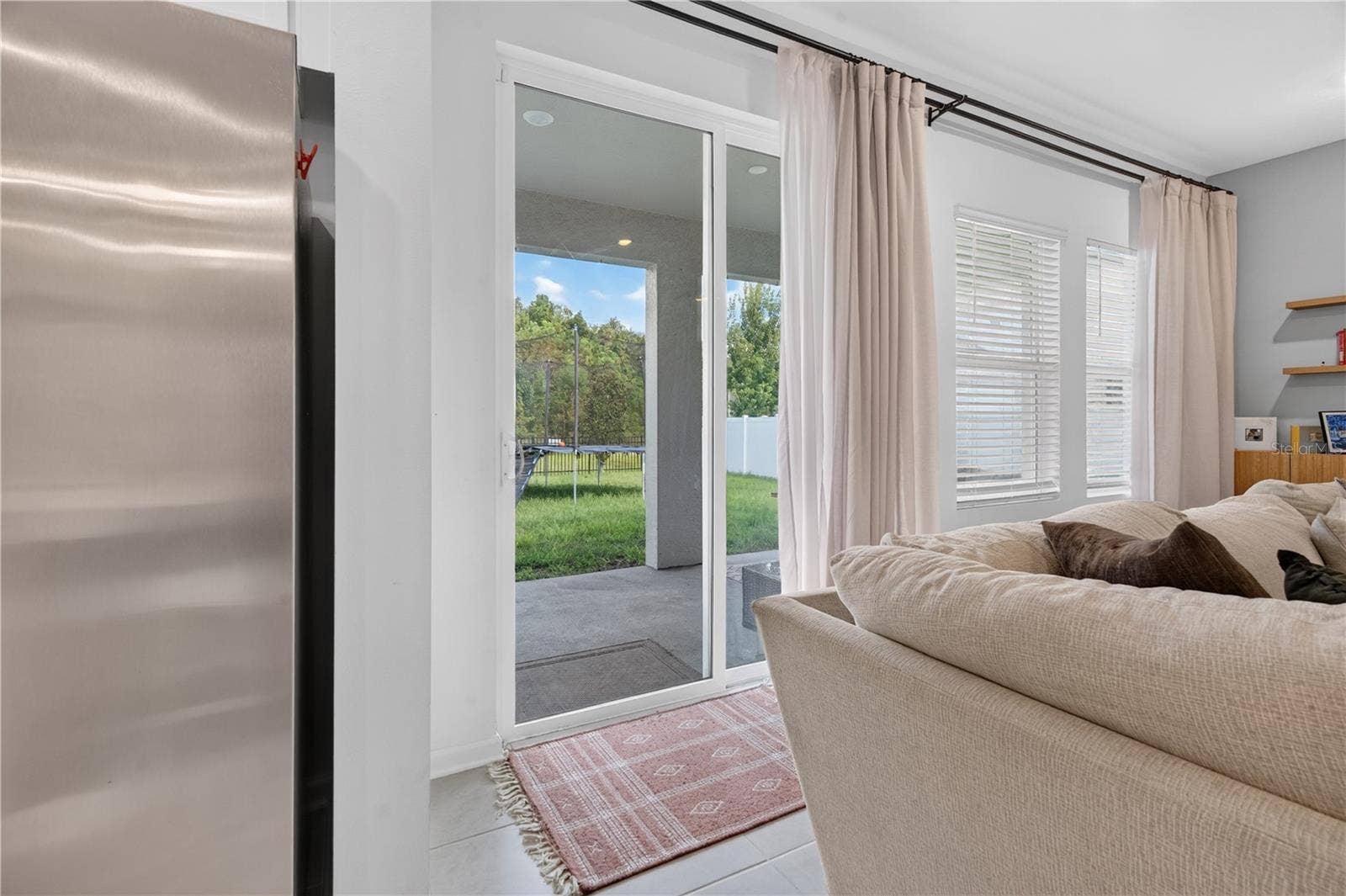 685 PERONI AVENUE, Debary, FL 32713 Sliding door leading to the backyard