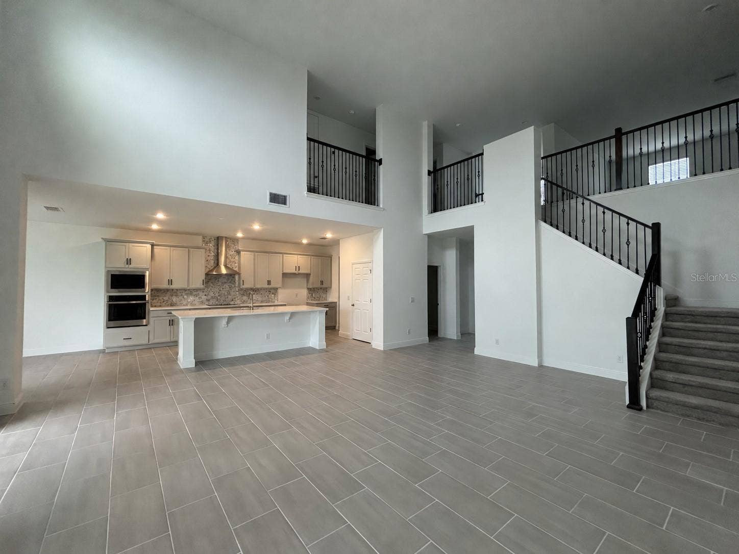 7028 ROLLING GARDENS LOOP, Groveland, FL 34736 Kitchen & Great Room