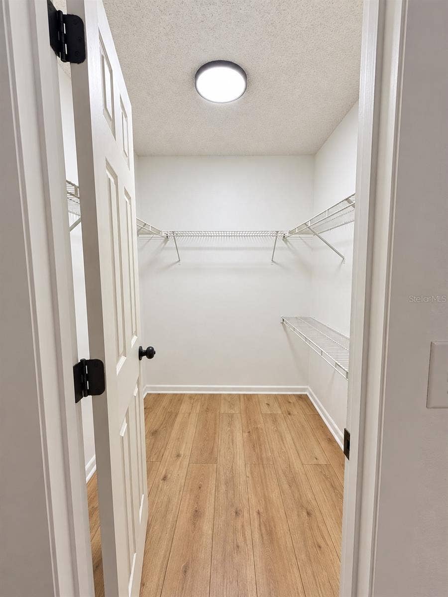 86 LAKE DAISY BOULEVARD, Winter Haven, FL 33884 guest closet