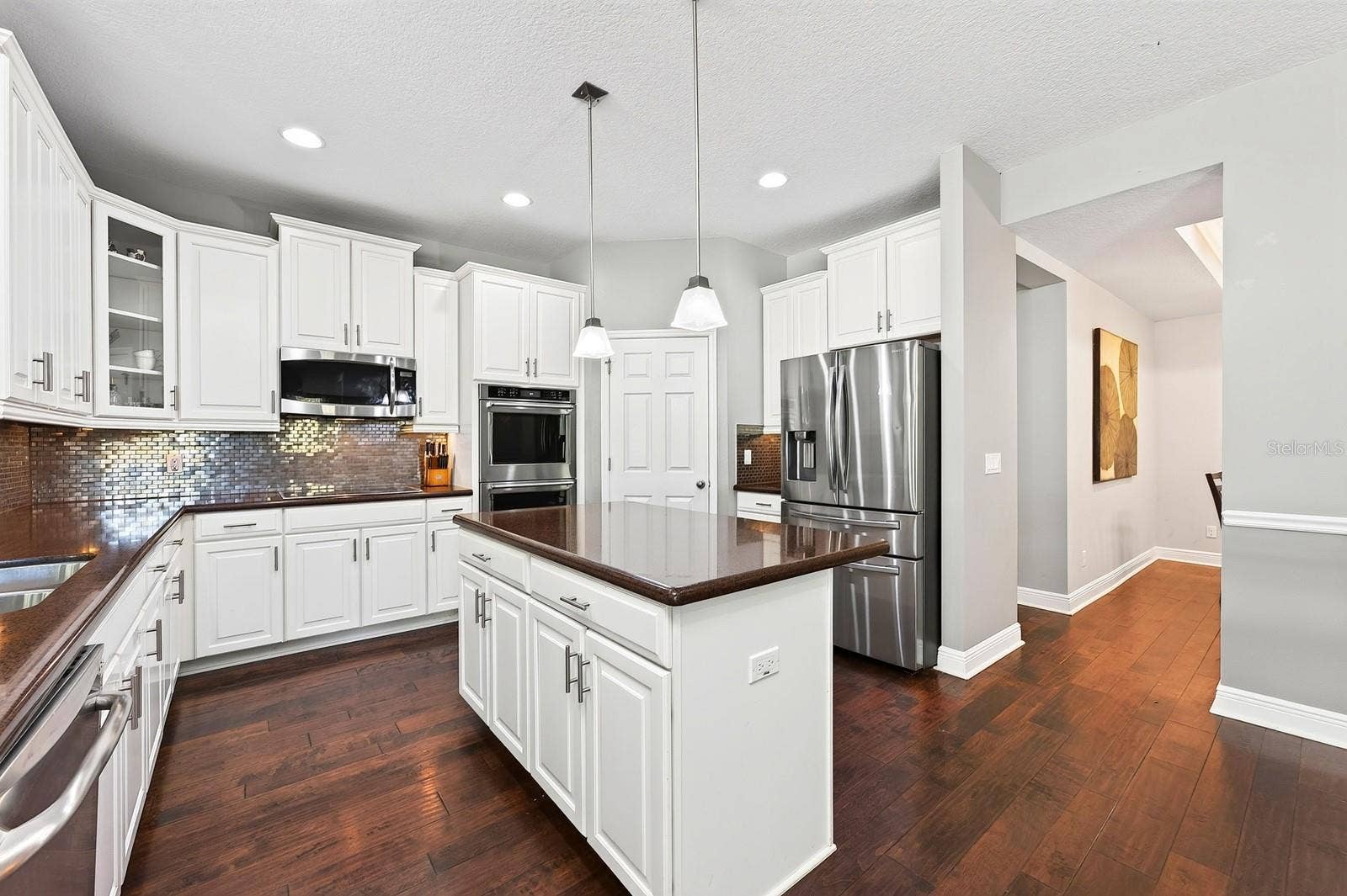 4443 PINE GOLD AVENUE, Apopka, FL 32712 Ample cabinet, counter and storage space.