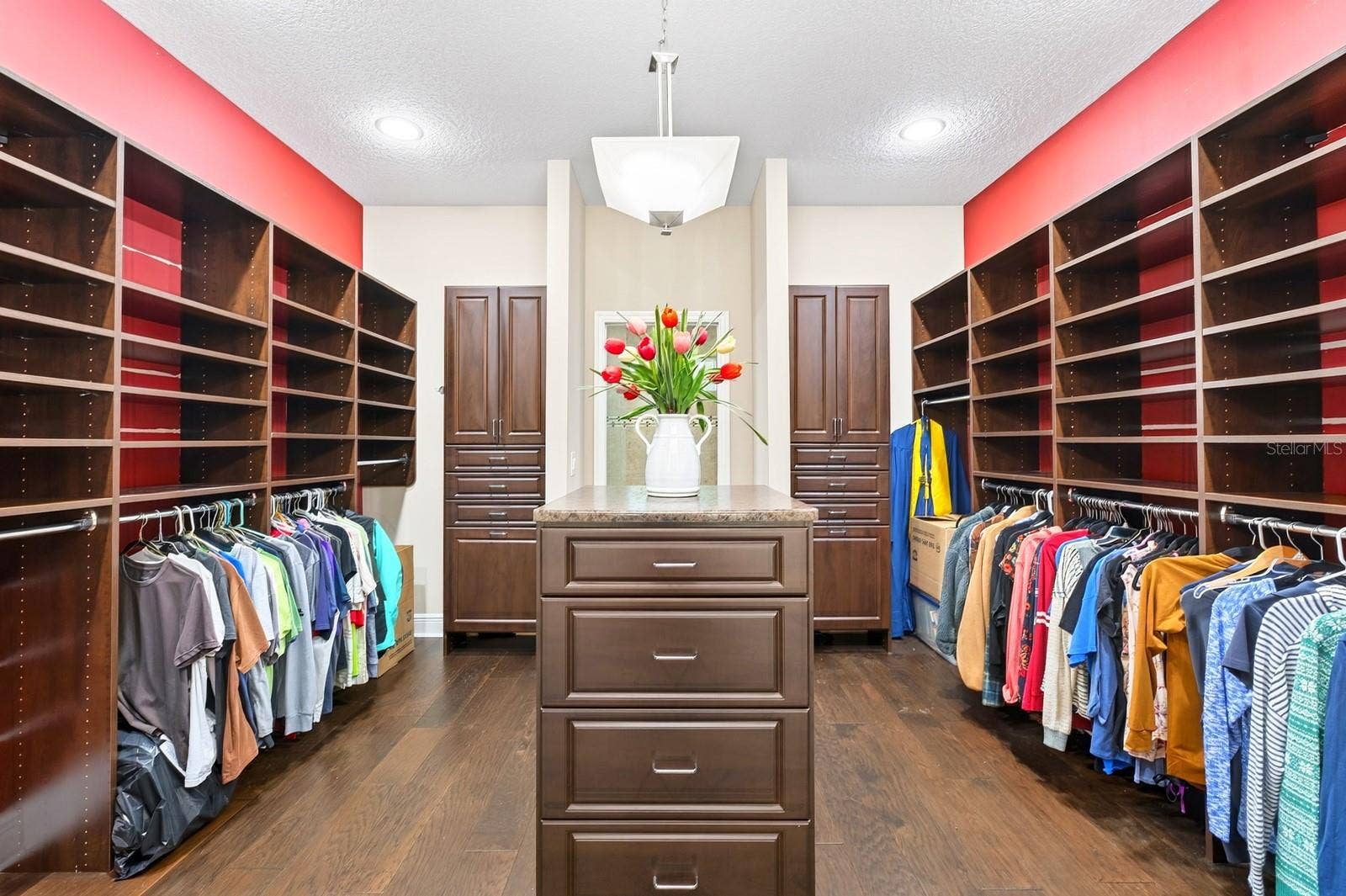 4443 PINE GOLD AVENUE, Apopka, FL 32712 13x13 dual sided walk-in closet with custom storage.