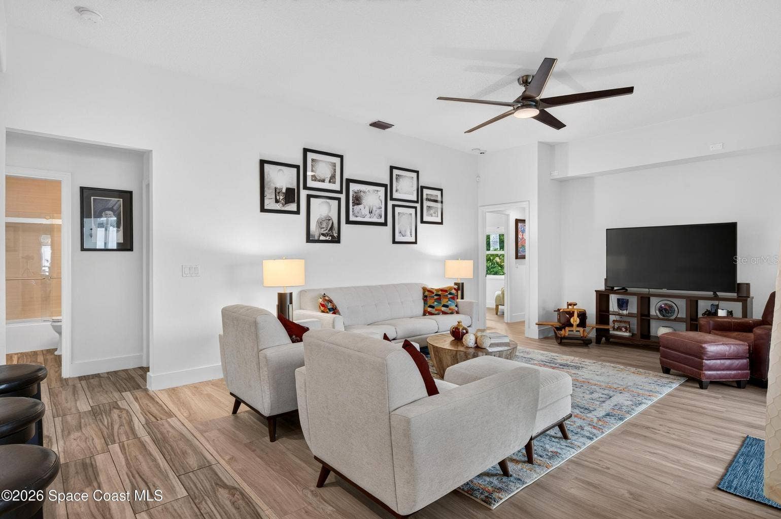 Spacious family room, wood look floors