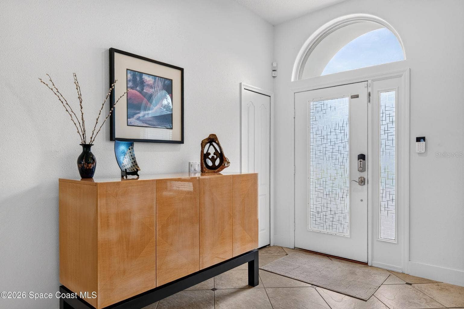 Bright foyer with arched transom