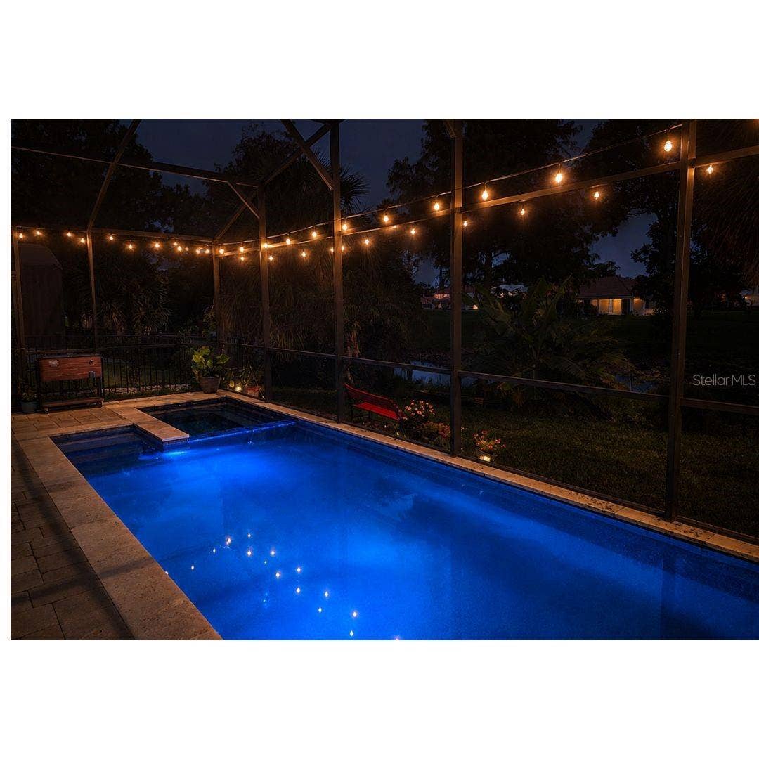 30084 ISLAND CLUB DRIVE DRIVE, Deer Island, FL 32778 Pool view at night