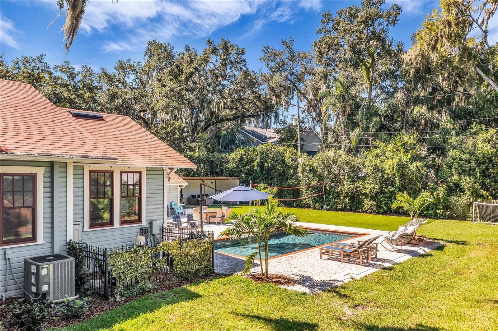 234 N LAKEVIEW AVENUE, Winter Garden, FL 34787 The enormous fully fenced backyard is designed for year-round enjoyment with a gas-heated saltwater sport pool, outdoor kitchen, expansive brick paved deck, detached covered lanai, and low-maintenance turf.