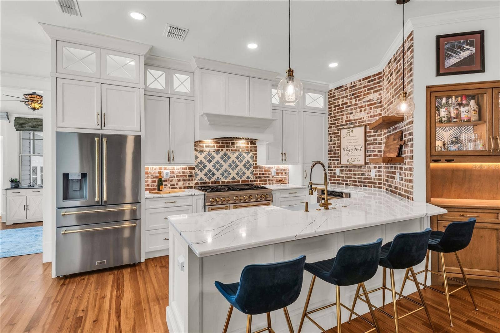 234 N LAKEVIEW AVENUE, Winter Garden, FL 34787 The chef's kitchen is a true focal point with a distinctive mix of old-world charm and modern design that combine luxury and function