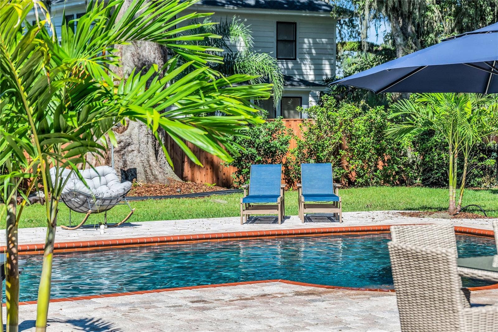 234 N LAKEVIEW AVENUE, Winter Garden, FL 34787 The enormous fully fenced backyard is designed for year-round enjoyment with a gas-heated saltwater sport pool, outdoor kitchen, expansive brick paved deck, detached covered lanai, and low-maintenance turf.