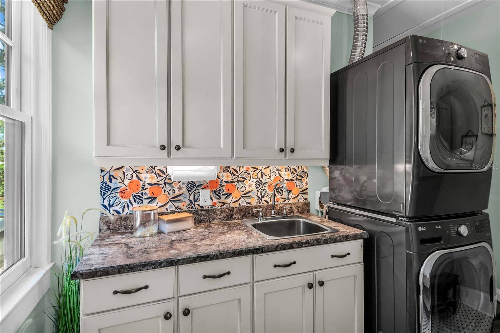 234 N LAKEVIEW AVENUE, Winter Garden, FL 34787 Laundry Room with sink, counterspace and cabinets for everday convenience