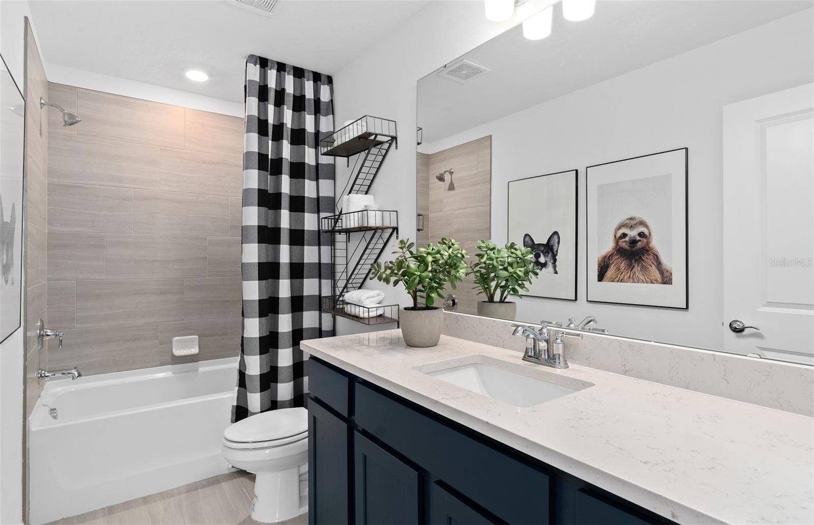 5088 SHRUB LEAF ALLEY, St Cloud, FL 34771 Model Home Design Only. Pictures and furnishings are for illustrative purposes only. Elevations, colors and options may vary. Furniture is for model home staging only.?