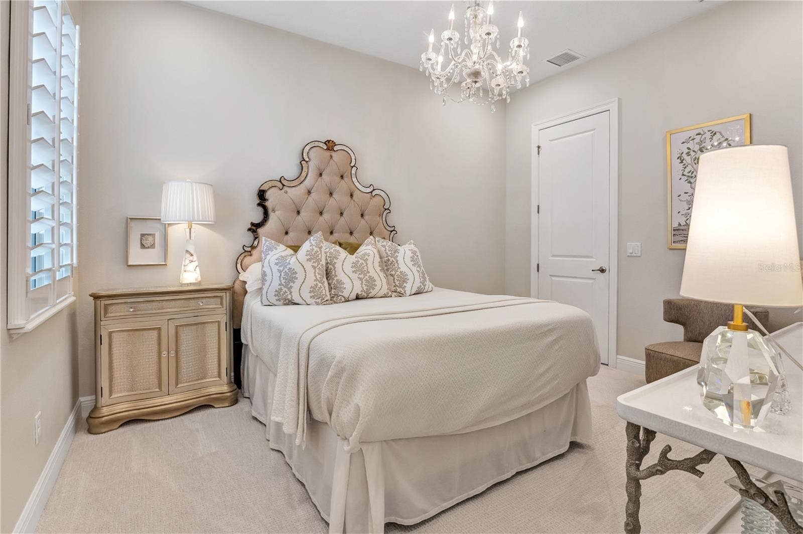 15749 CUTTER SAIL PLACE, Winter Garden, FL 34787 Another perspective highlighting the bedroom's elegant details and neutral finishes.