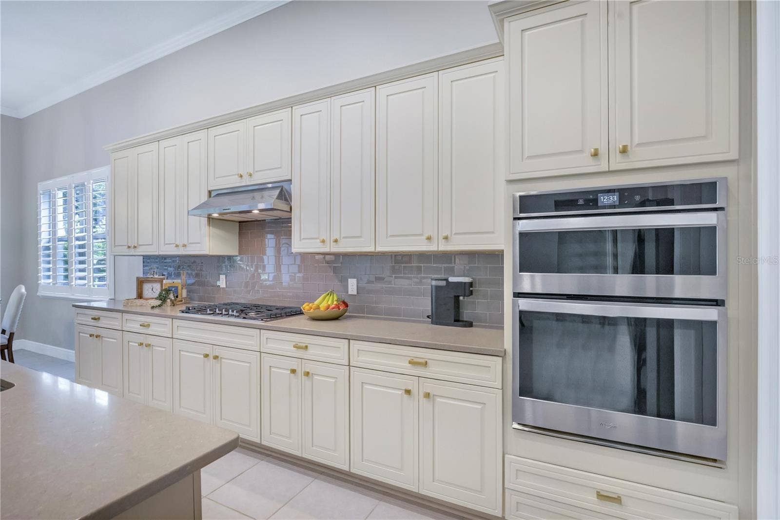 15749 CUTTER SAIL PLACE, Winter Garden, FL 34787 Beautifully appointed kitchen featuring generous counter space and stylish finishes.