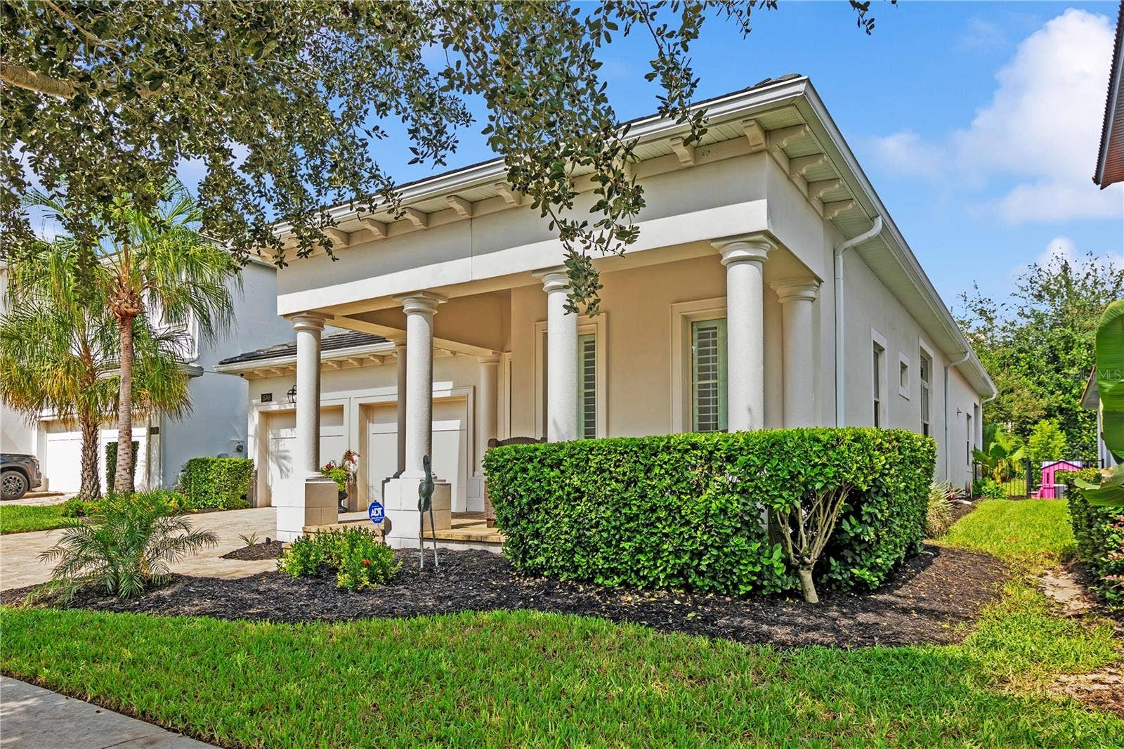 15749 CUTTER SAIL PLACE, Winter Garden, FL 34787 Beautiful curb appeal and timeless architectural details welcome you home.