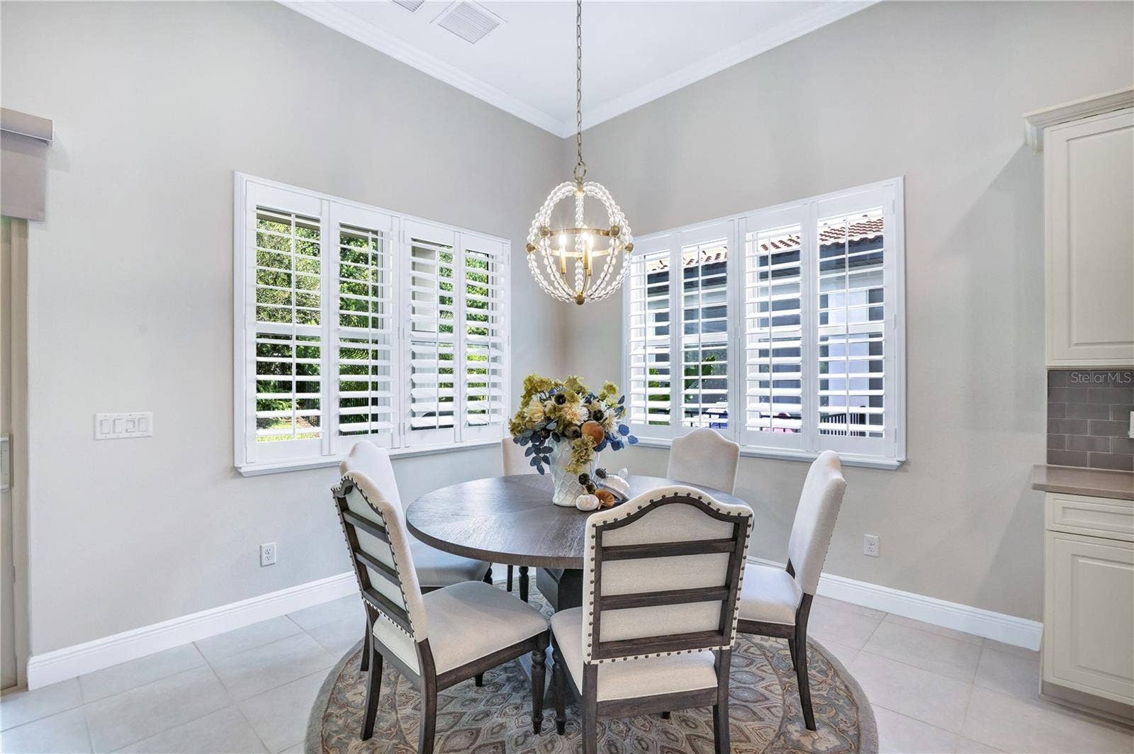 15749 CUTTER SAIL PLACE, Winter Garden, FL 34787 Charming dining space offering a comfortable setting for everyday meals and special occasions.