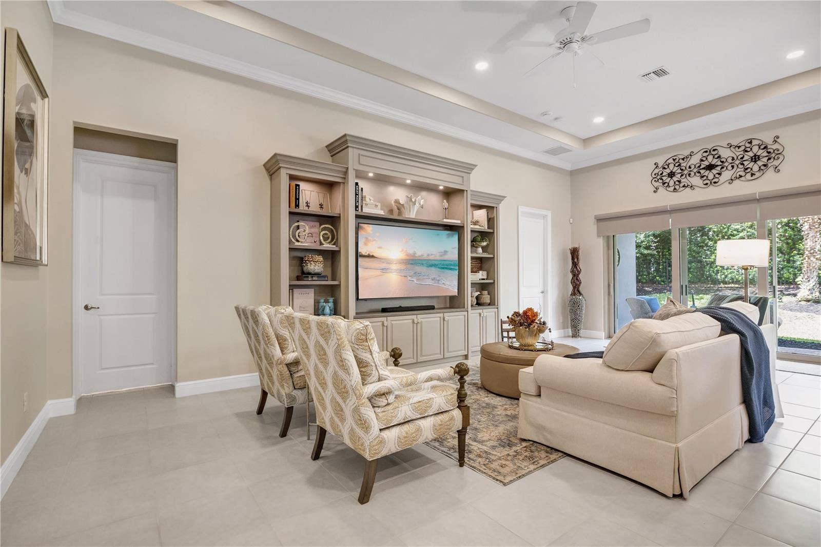 15749 CUTTER SAIL PLACE, Winter Garden, FL 34787 Spacious living area with beautiful finishes and abundant natural light.