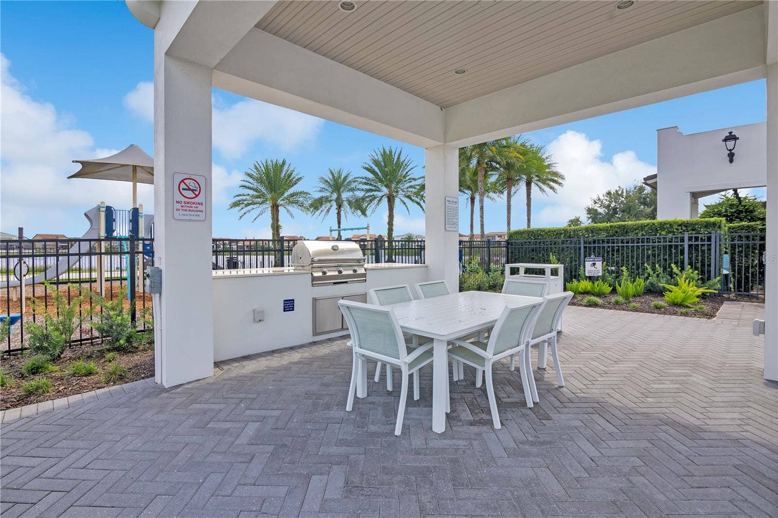 15749 CUTTER SAIL PLACE, Winter Garden, FL 34787 Covered community grilling and dining area, perfect for outdoor gatherings.