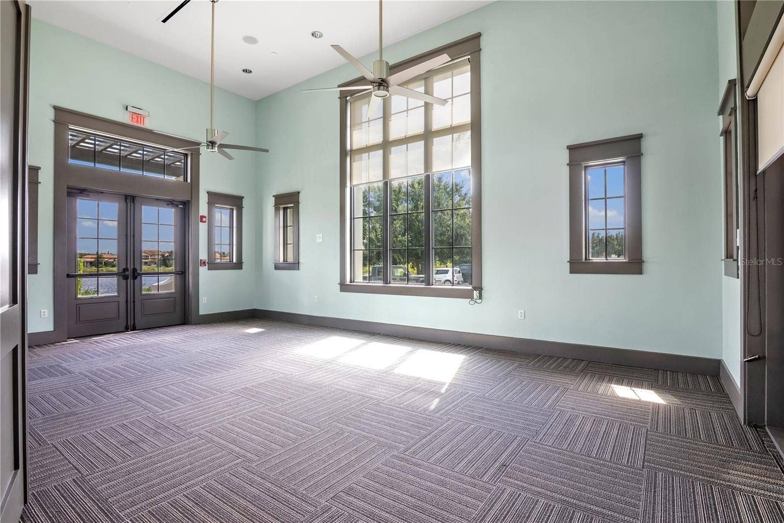 15749 CUTTER SAIL PLACE, Winter Garden, FL 34787 Dedicated yoga and wellness room offering a peaceful, inviting space for exercise, stretching, meditation, and relaxation.